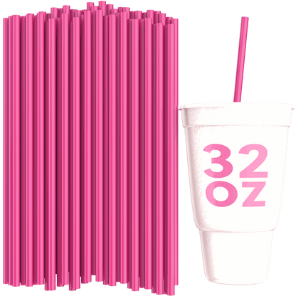Unwrapped pink 32 oz to-go straws next to white 32 oz cup with pink straw