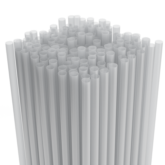 Stack of clear plastic drinking straws on a white background