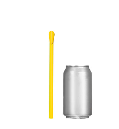Yellow unwrapped classic spoon straw beside a silver soda can for size comparison