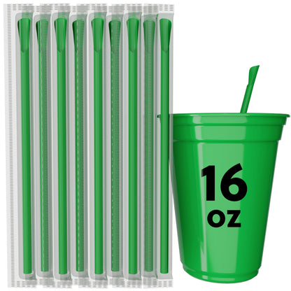 Set of green 8-inch scoop straws with spoon-shaped tips next to a 16 oz green cup for frozen drinks
