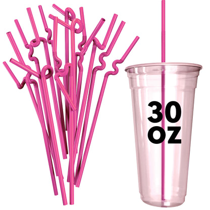 Bright pink extra flexible art straws twisted into fun shapes next to a clear 30 oz plastic cup with a bent straw
