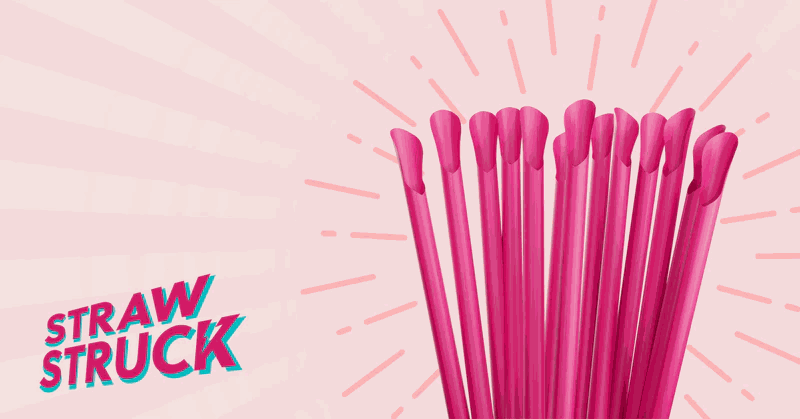 Bright pink paper wrapped classic jumbo straws standing upright on a light pink background with "Straw Struck" text