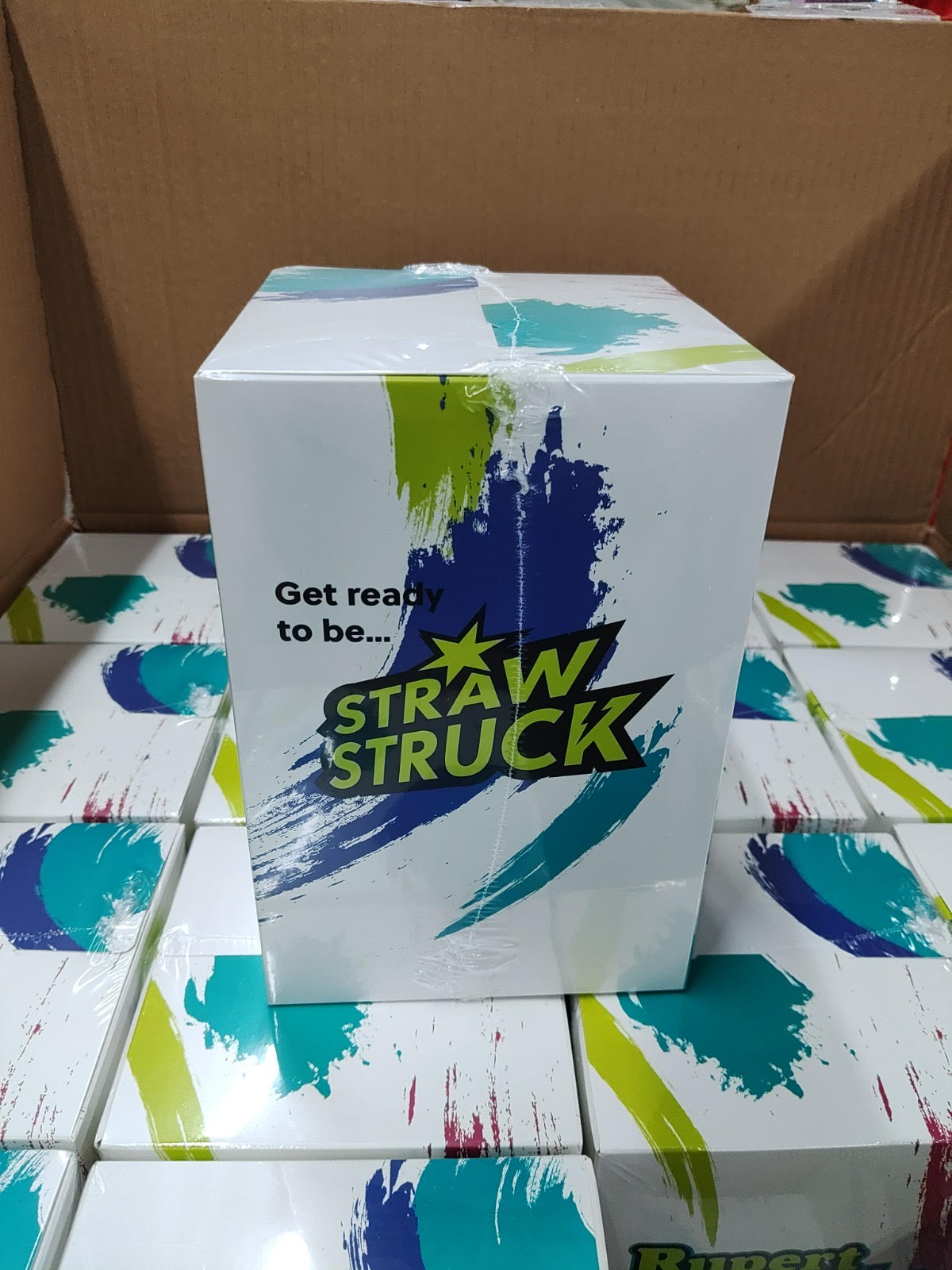 Straw-Struck retail box stacked on a pallet of boxes